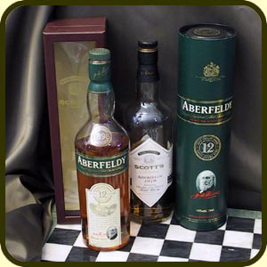 Aberfeldy whisky bottles and a chess board
