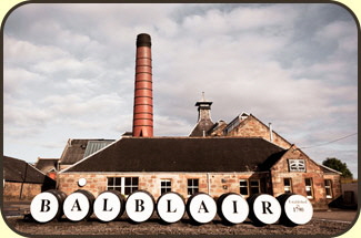 Balblair distillery and some painted casks